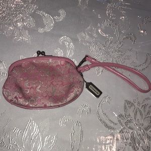 Pink change coach wristlet